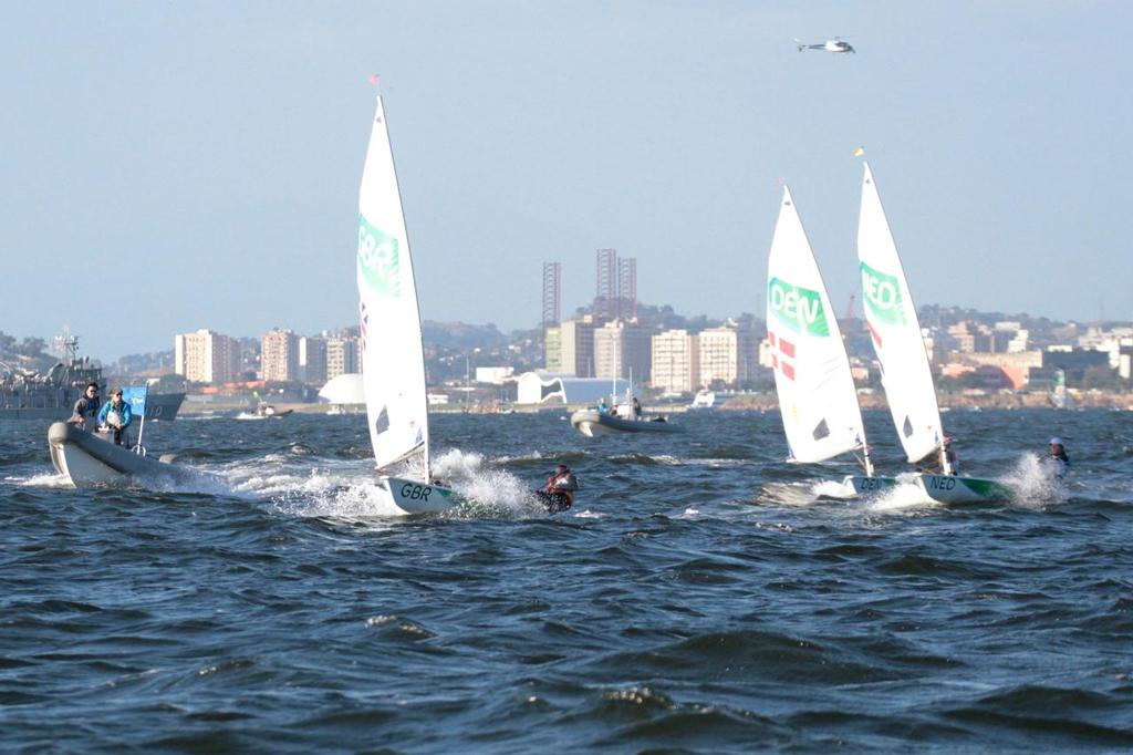 Day 6 - Laser Radial August 13, 2016. Final Qualifier. Jury watch the race leaders coming into the finish © Richard Gladwell www.photosport.co.nz